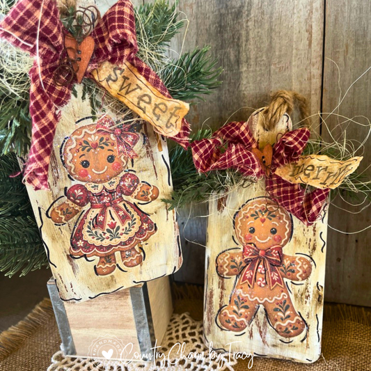Folk art gingerbread boy and girl rustic wooden Christmas ornaments, set of two
