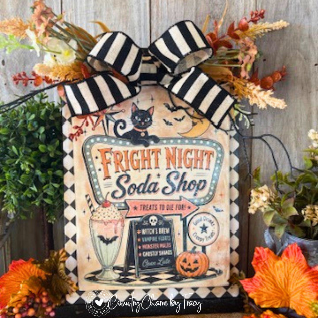 Fright Night Soda Shop retro Halloween sign decor with vintage diner typography peekaboo black cat milkshake jack-o-lantern chalkboard menu orange gold cream green floral swag black white striped bow and jute hanger by Country Charm by Tracy