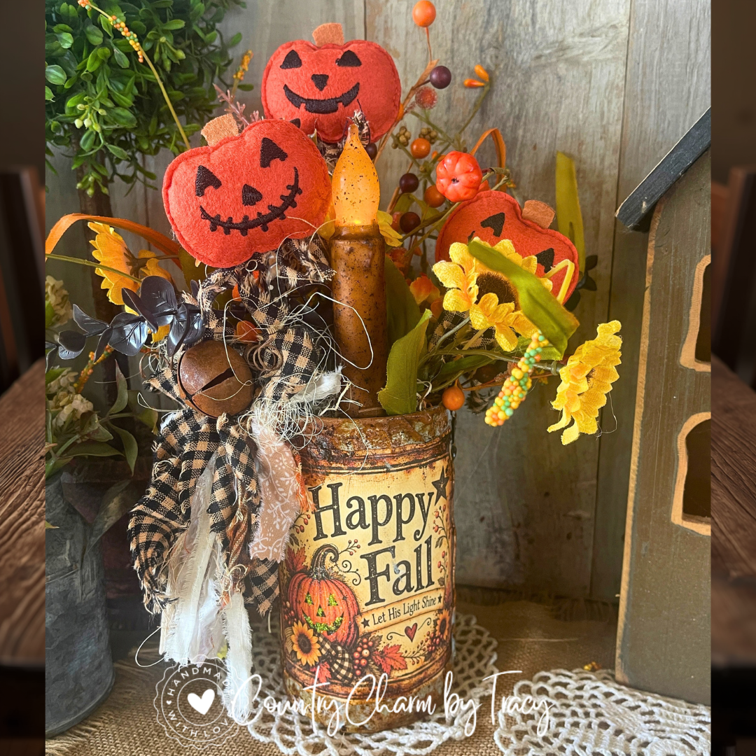 Happy Fall 6-inch tin can arrangement with three felt jack-o'-lantern pumpkins, primitive candle and sunflowers